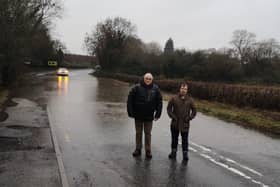 Couns Dave Shaw (left) and Lee Waters on flooded-again Watnall Road. Photo: Submitted