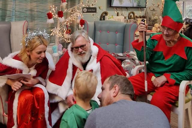 Local children and their parents came to visit Santa