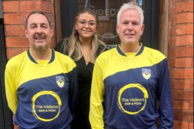 Jay Flint and Ian Utting from Hucknall Walking FC in the new kit with Hideout manager Beckie Murray. Photo: Submitted