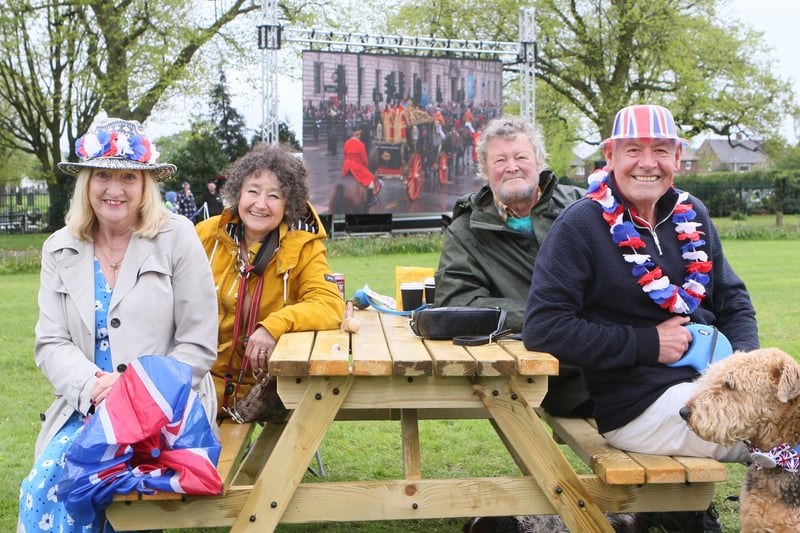 Titchfield Park staged a soggy celebration with Coronation service being shown on the big screen, Braving the rain to watch were Heather and Martin Gill and Brenda and Michael Oldham