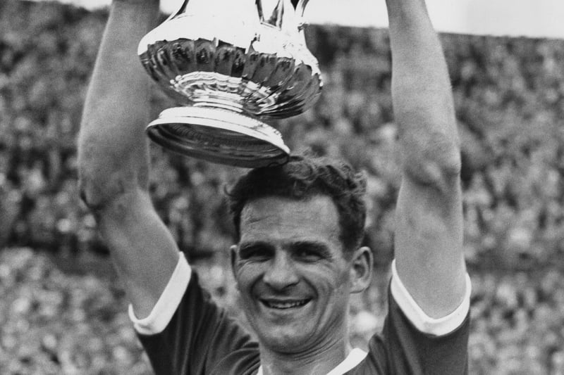 Jack Burkitt holds up the cup after his team defeated Luton Town in the FA Cup Final at Wembley, London, 2nd May 1959.