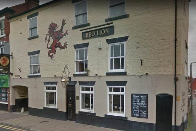 Robinson was charged with breaking into the Red Lion on High Street last year