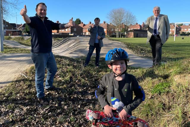 Councillors Jason Zadrozny (left), Lee Waters and David Shaw (right) with Coun Waters' six-year-old son Alexander, at the skate/BMX track on Nabbs Lane Park