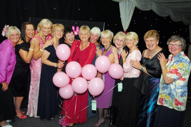 Kirkby Inner Wheel president Judi Parkinson, sixth left, is joined by the organising committee and group members at their annual charity ball held at the John Fretwell Centre.