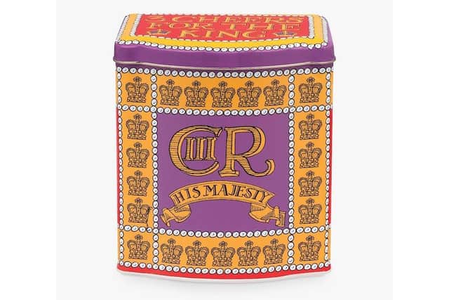 A commemorative tea caddy adorned with the King’s cypher, from John Lewis.