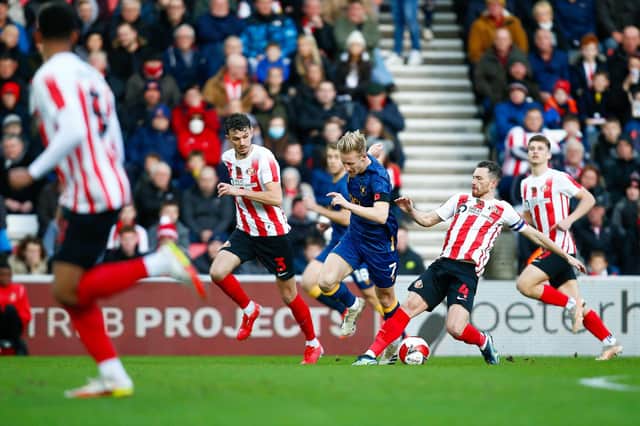 Mansfield Town midfielder Harry Charsley under pressure in the win at Sunderland. Photo by Chris Holloway/The Bigger Picture.media