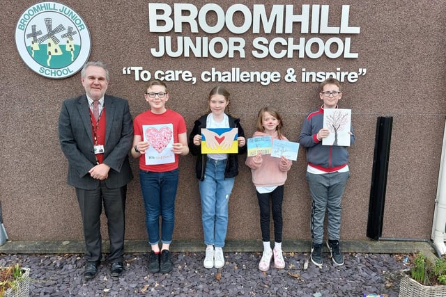 The motto says it all as pupils of Broomhill Junior School stand with head teacher Andrew Beckinsale-Yates with a selection of their Letters of Hope