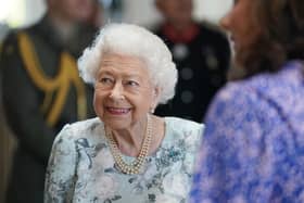 Queen Elizabeth II smiles during a visit to officially open the new building at Thames Hospice just two months ago (Photo by Kirsty O'Connor-WPA Pool/Getty Images)