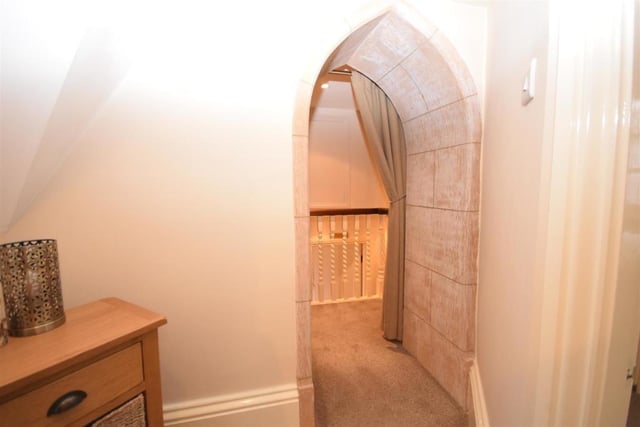 So typical of the charming character features at the property is this Gothic-style stone archway that leads to the accommodation on the second floor. Walk through here and you are truly the king or queen of the castle!