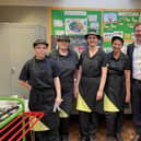 Bulwell MP Alex Norris and Lucy Dubber from Nottingham Council with catering staff at Rufford Primary School. Photo: Other
