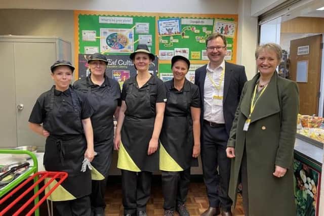 Bulwell MP Alex Norris and Lucy Dubber from Nottingham Council with catering staff at Rufford Primary School. Photo: Other