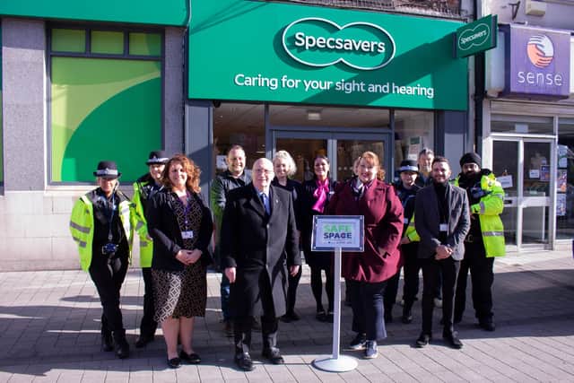 Representatives from the police and council join Hucknall with representatives of Hucknall businesses that have become Safe Space accredited