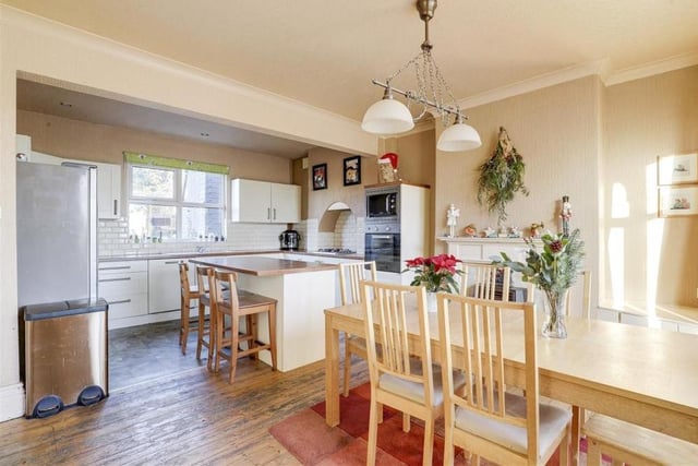 One of the £375,000-plus property's most attractive assets is this kitchen/diner.  With a range of fitted base and wall units, plus integrated appliances, the kitchen opens out into a dining space.