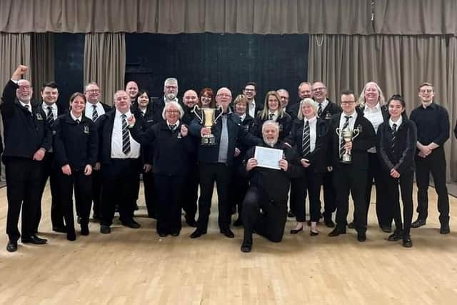 Newstead Brass celebrate winning the North East Midlands Band Association title