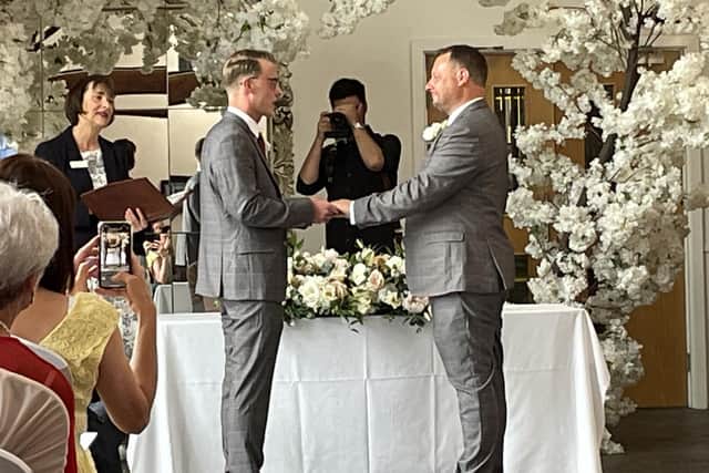 Coun Jason Zadrozny, right, marries his partner Jack Bland.