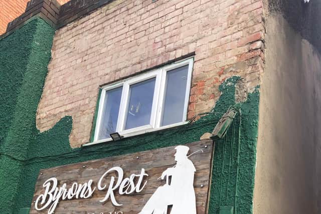 Violent winds tore the cladding off the front of the Byrons Rest pub in Hucknall. Photos: Richard Darrington