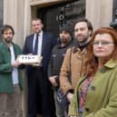 Campaigners hand their petition in to 10 Downing Street. Photo: Rikki Blue