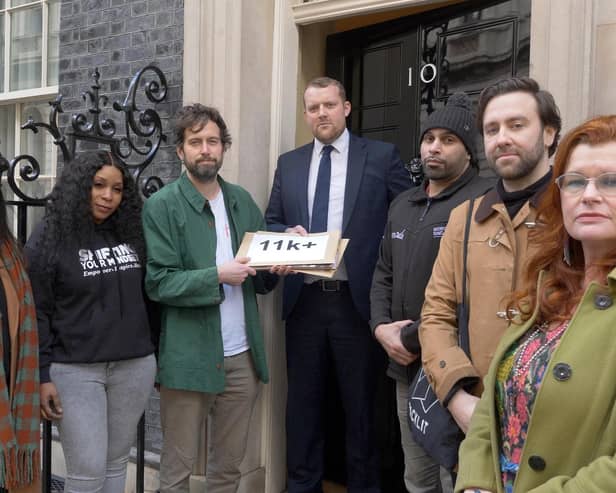 Campaigners hand their petition in to 10 Downing Street. Photo: Rikki Blue
