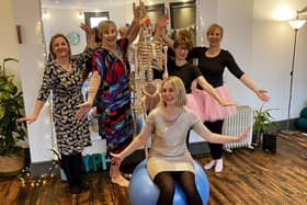 Party Dress Day at a pilates class, with Alex Lloyd, front centre.