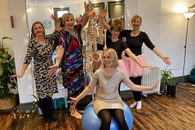 Party Dress Day at a pilates class, with Alex Lloyd, front centre.