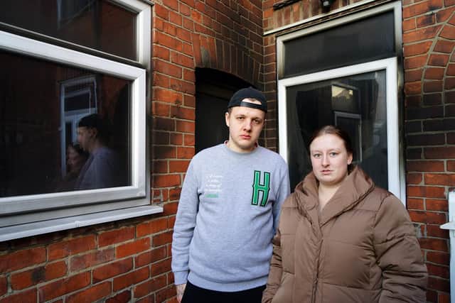 Caoimhe McLaughlin and Brandon Booth outside their fire damaged house in Hucknall