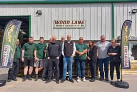 Pat Kelly (centre) and the Wood Lane Timber team are celebrating 20 years in business