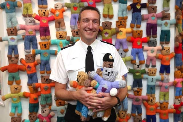 Deputy Chief Constable Steve Cooper with some of the Brave Bears police will use to help support vulnerable children and young crime victims. Photo: Nottinghamshire Police
