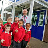Head teacher Rob Slater and pupils celebrate Annesley Primary School & Nursery's Good Ofsted report