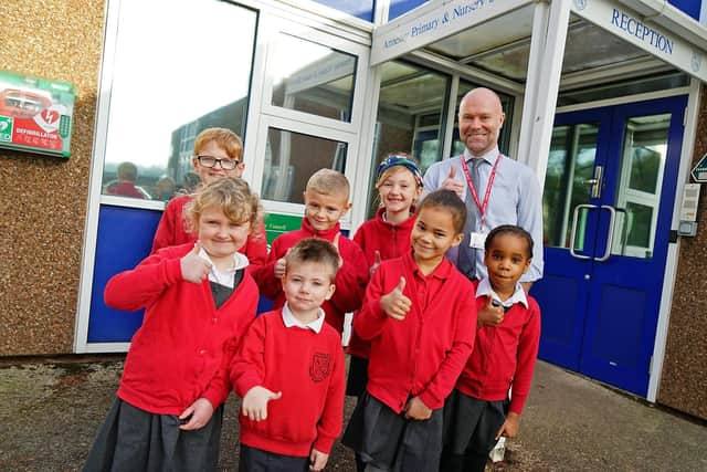 Head teacher Rob Slater and pupils celebrate Annesley Primary School & Nursery's Good Ofsted report