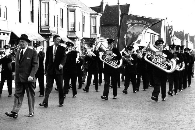 Back to 1963 for this view of Harton Colliery Band leaving Armstrong Hall to play its part in the Durham Miners Gala.