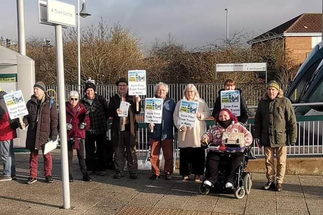 Campaigners protested against proposals to cut concessionary tram travel at Hucknall tram stop. Photo: Submitted