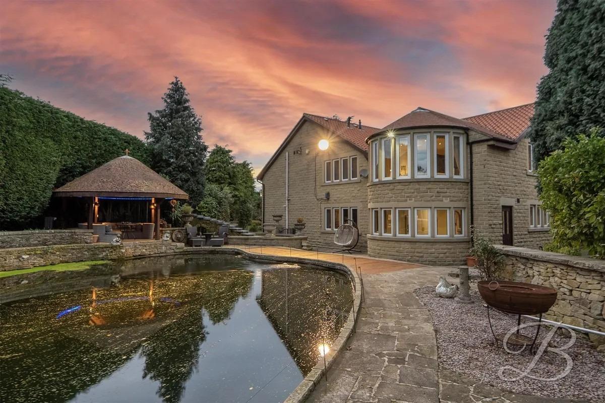 The grounds offer a peaceful and versatile setting for enjoying outdoor living.
