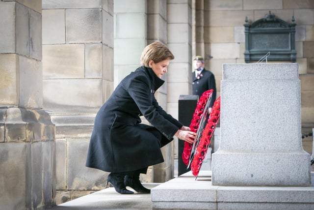 First Minister of Scotland Nicola Sturgeon lays a wreath during the Remembrance Sunday service at the Stone of Remembrance outside Edinburgh City Chambers in Edinburgh.