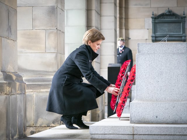 First Minister of Scotland Nicola Sturgeon lays a wreath during the Remembrance Sunday service at the Stone of Remembrance outside Edinburgh City Chambers in Edinburgh.