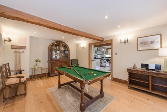 The dining room is so sizeable that there is even space for a pool table. Fancy a quick game before dinner?
