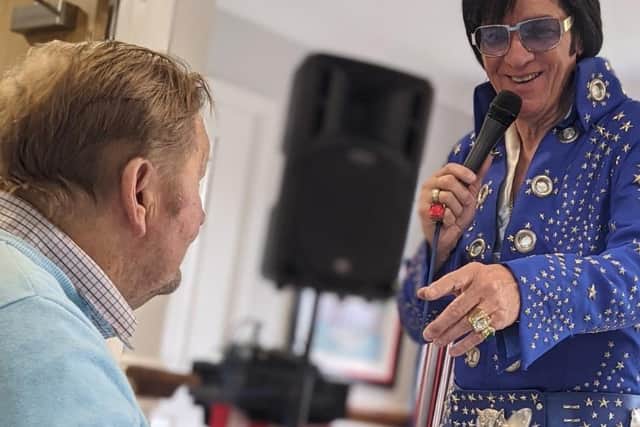A Elvis tribute act performed at the suite-opening party