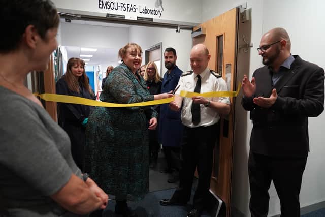 Nottinghamshire police and crime commissioner Caroline Henry and chief constable Craig Guildford cut the ribbon to open the newly refurbished forensic labs