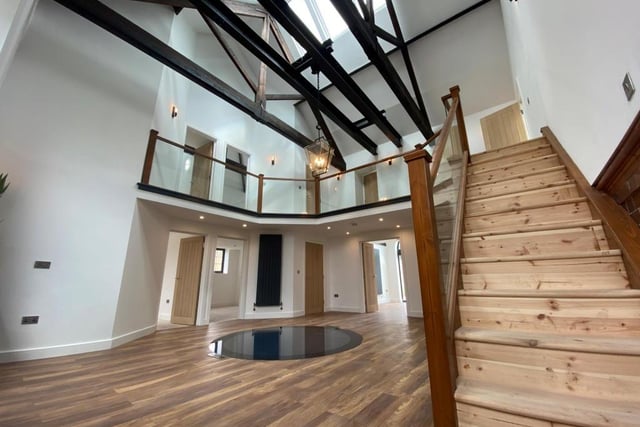 As soon as you walk through the door, you get a sense of openness and light. The central atrium, complete with its characterful staircase, is an impressive way to introduce the property.