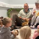 Grandparents read stories to the children