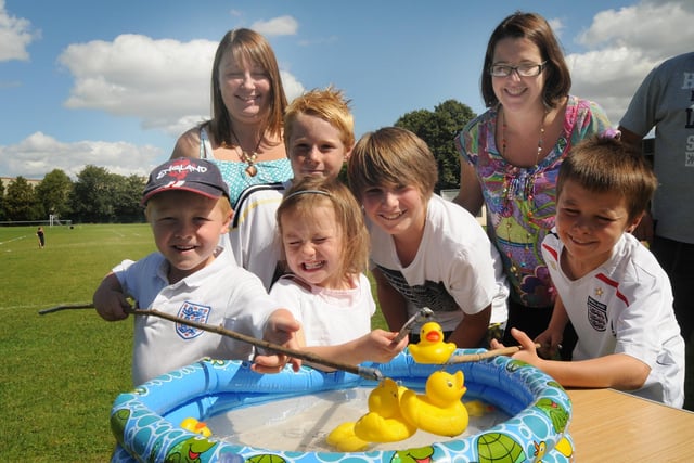 2010: Members of the Sisson and Richardson families try the Hook a Duck at the Hucknall Rolls-Royce Leisure Junior Football Club Fun Day