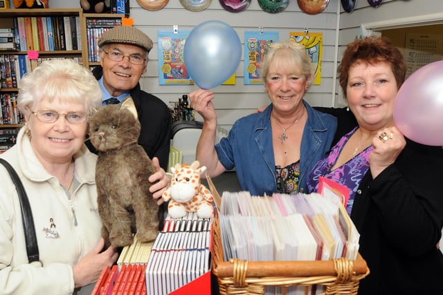 2010: Pictured at the opening of Fur-ever Friends in Hucknall are first customers Anne and Fred Goodall, with Gail Lambert (volunteer) and manager Colleen Worley.