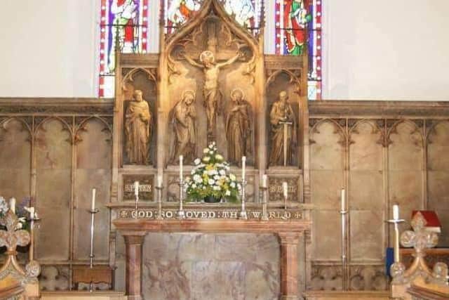 The altar at the church, from where the six candlesticks were stolen.