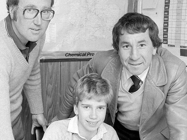 Future star Simon Coleman signs his pro forms in 1983.