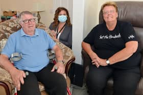 Kirkby grandad Kev Evans with wife Sue and Age UK connect support worker, Deborah Hughes.