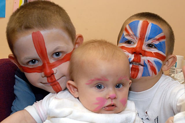 2007: William Brown, seven, Millicent Brewitt, seven months, and Jake Brown, five, display their face painting at Healthy Living Centre Bulwell's fun day.