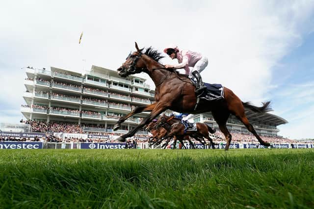 The Investec Derby, won here in 2019 by Anthony Van Dyck, has been re-scheduled for Saturday July 4. (Photo by Alan Crowhurst/Getty Images)