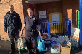 Hucknall firefighters at one of last year's pick-up points with several bags of donations. Photo: Submitted