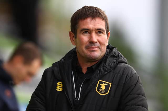 Mansfield manager Nigel Clough - biding his time in window.