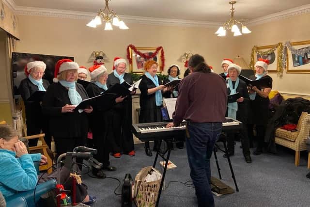 Members of Bulwell Riverside Community Choir led the carol singing at Hall Park