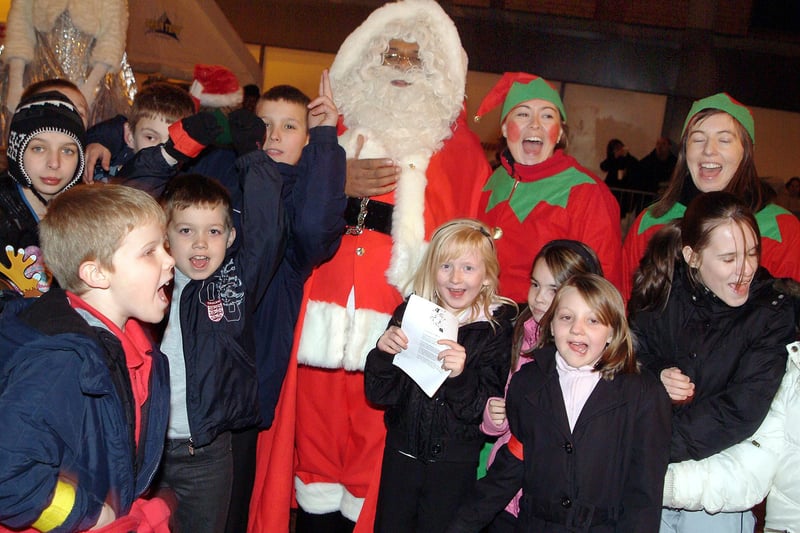 2008: Youngsters gather around Father Christmas during the Bulwell Christmas lights switch-on.
